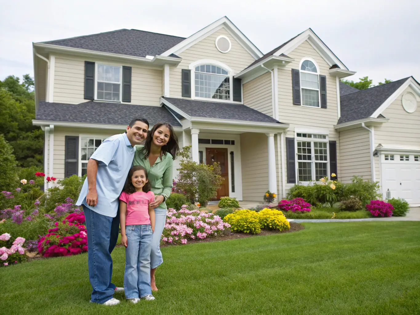 An image of a luxurious home with a family, representing wealth management and financial security.